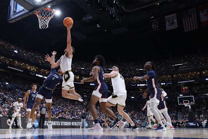 Boilermakers forward Mason Gillis (0) goes to the basket against the Fairleigh Dickinson Knights.